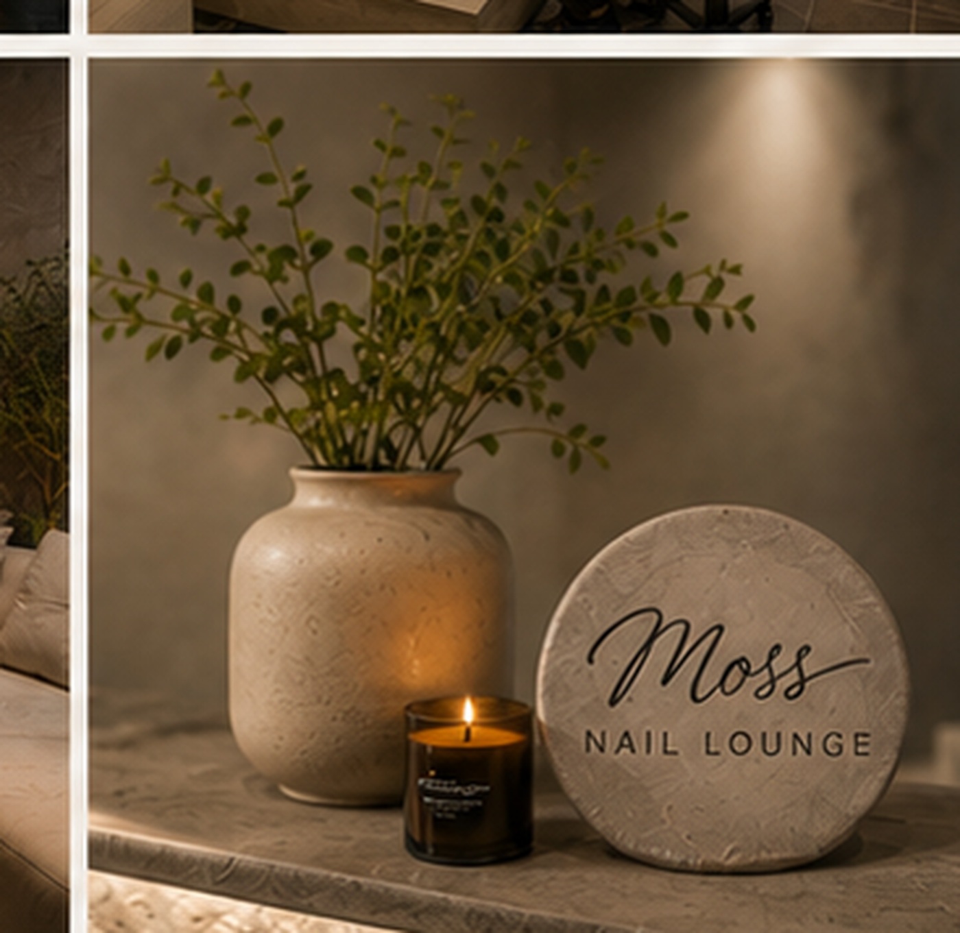 Moss Nail Lounge stone plaque detail with candle and greenery